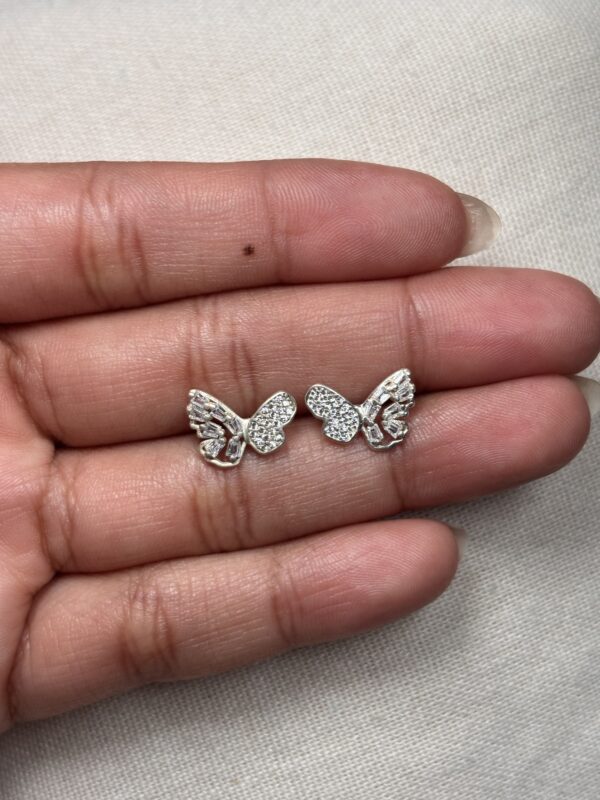 Topos mariposa asimetrica